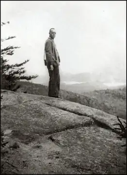 1930 observer Laurence Parker near the tower